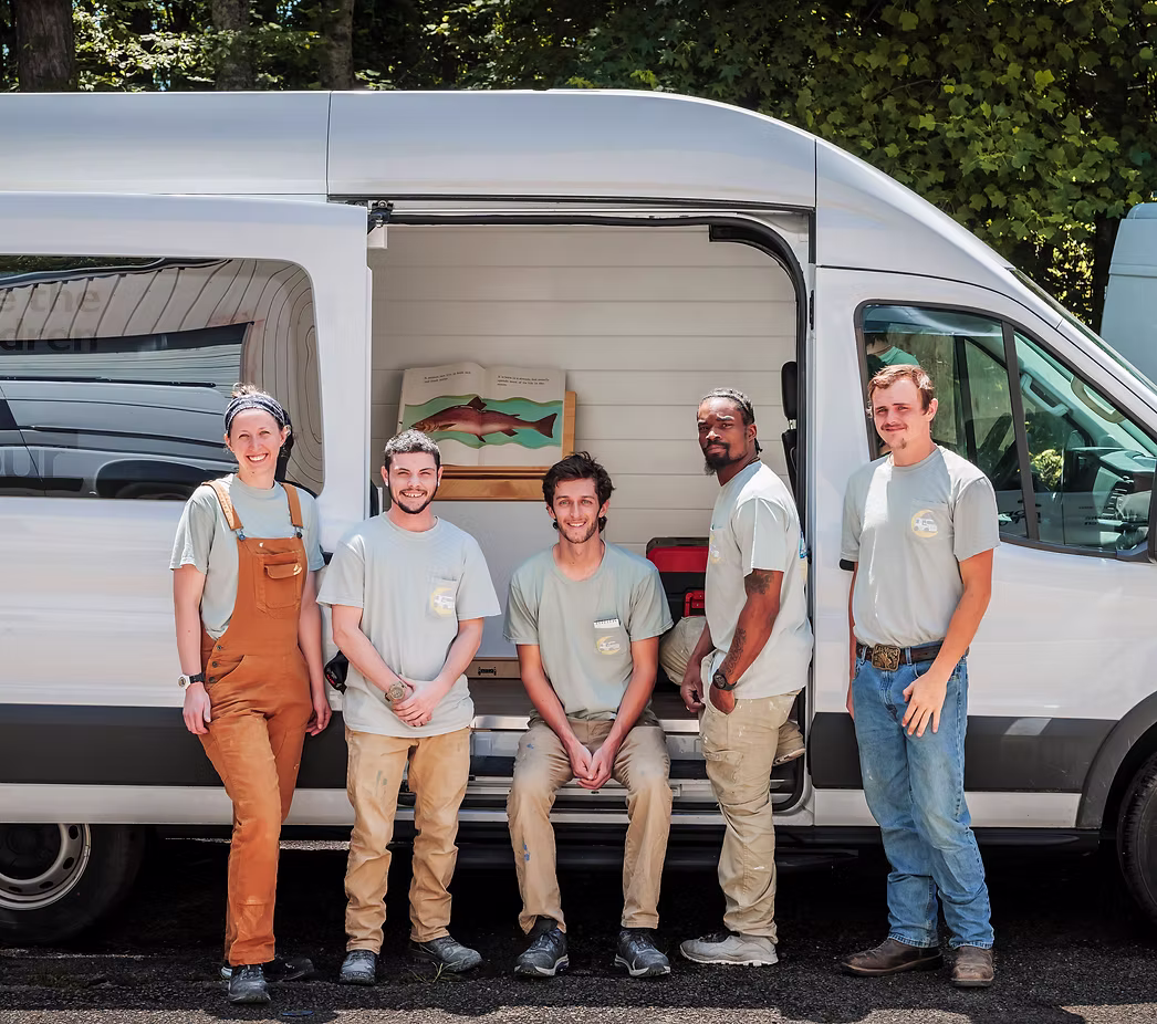 The Crescent Moon Vans crew in the workshop