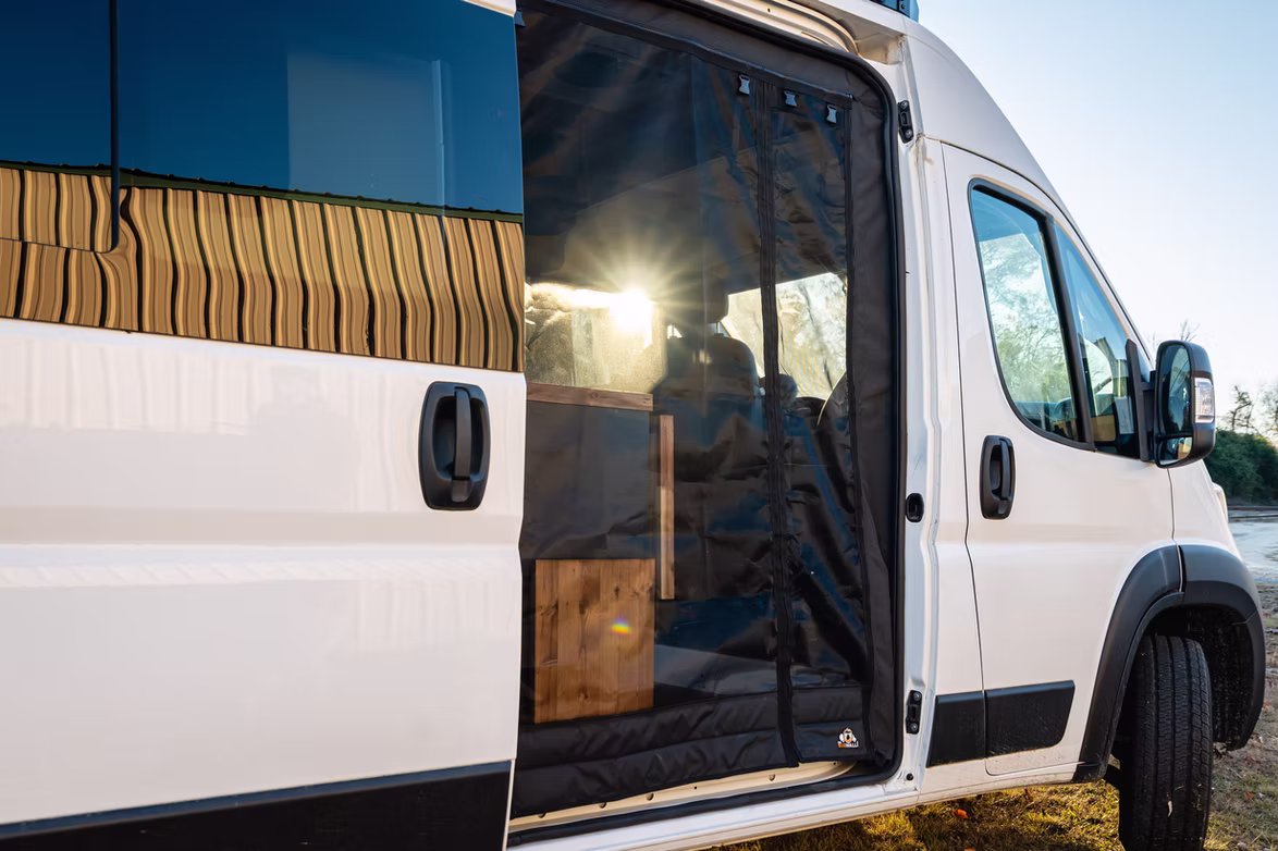 A finished campervan ready for sale outside the workshop